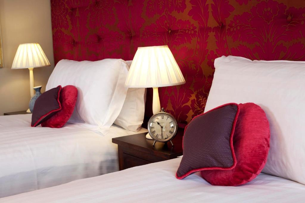 The Three Crowns Hotel Chagford Quarto foto A bedroom at the hotel