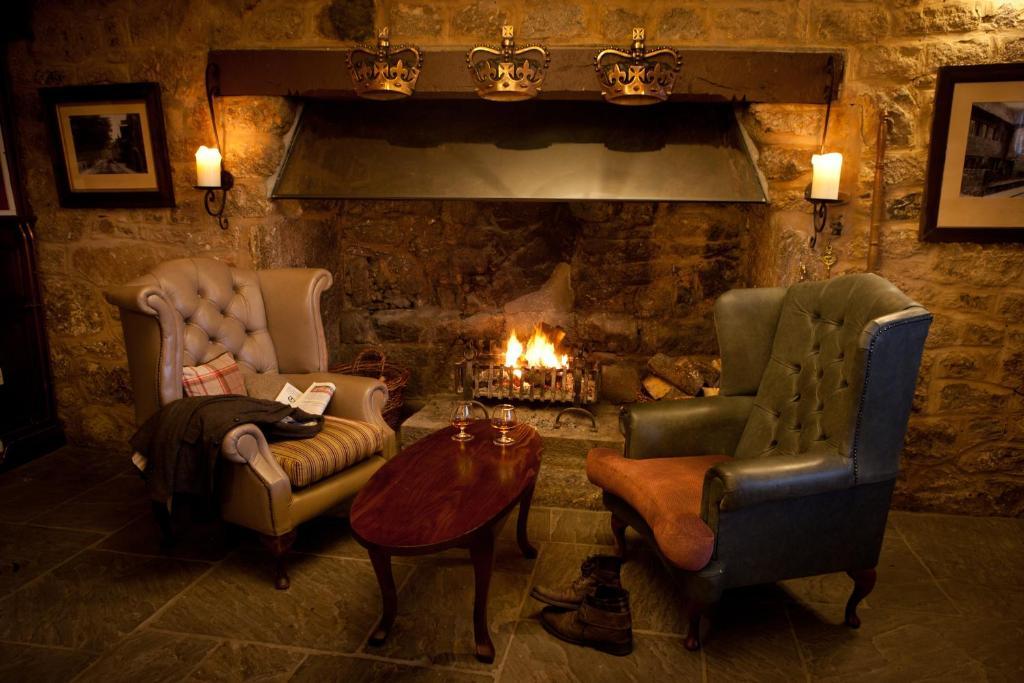 The Three Crowns Hotel Chagford Exterior foto The fireplace in the bar